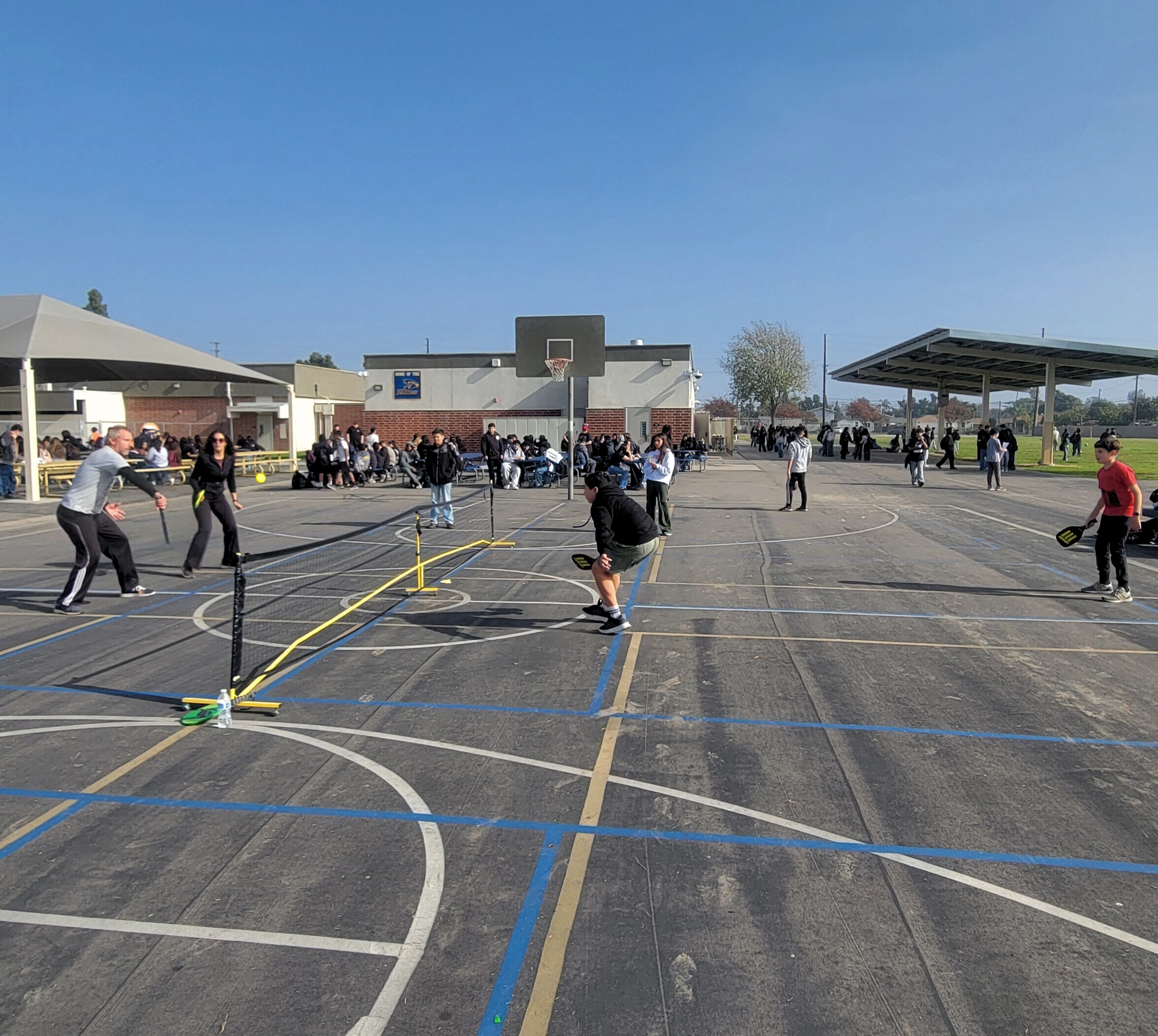 Lunchtime Pickleball Champs - Luke and Eli - battled Mr. Couch and Ms. Roman in a Student/Teacher match. (2025-12-17)