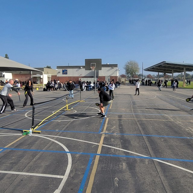 Lunchtime Pickleball Champs - Luke and Eli - battled Mr. Couch and Ms. Roman in a Student/Teacher match. (2025-12-17)